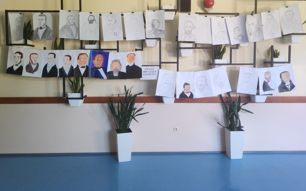 wystawa prac uczniów - portret Matejki i Moniuszki